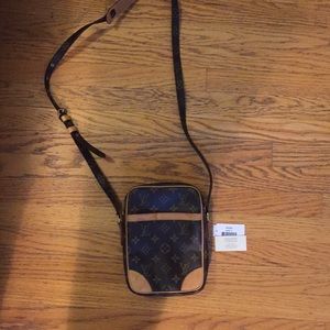 Genuine Louis Vuitton cross body bag.